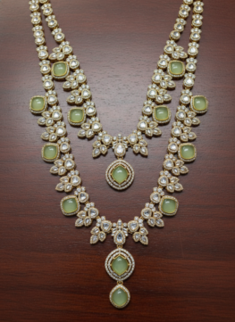 Necklace Set Detail on Polished Mahogany
